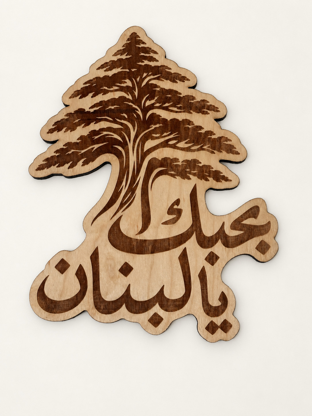 Front photograph of Lebanon · Cedar & Calligraphy, with background and lighting retouched.