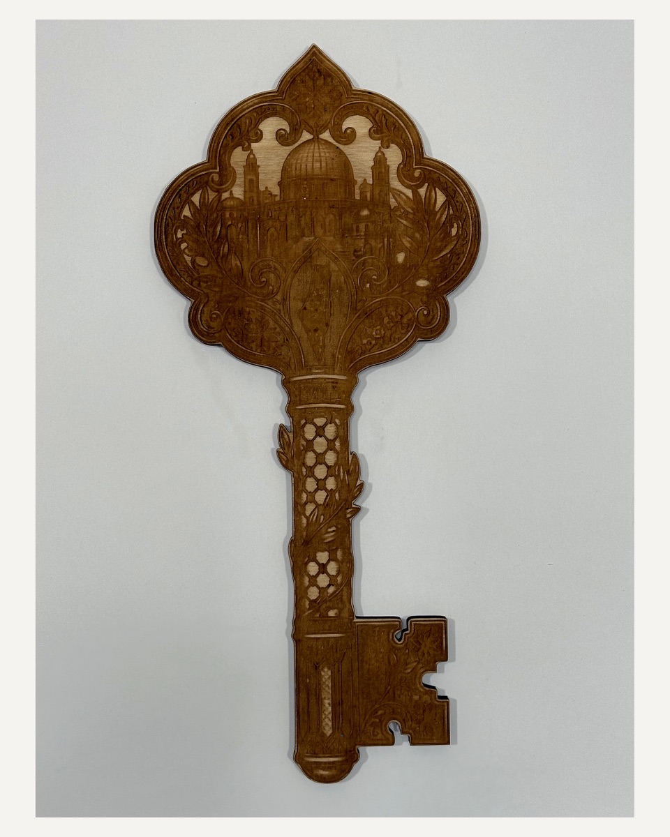 Front view of the engraved Key of Return wall art.