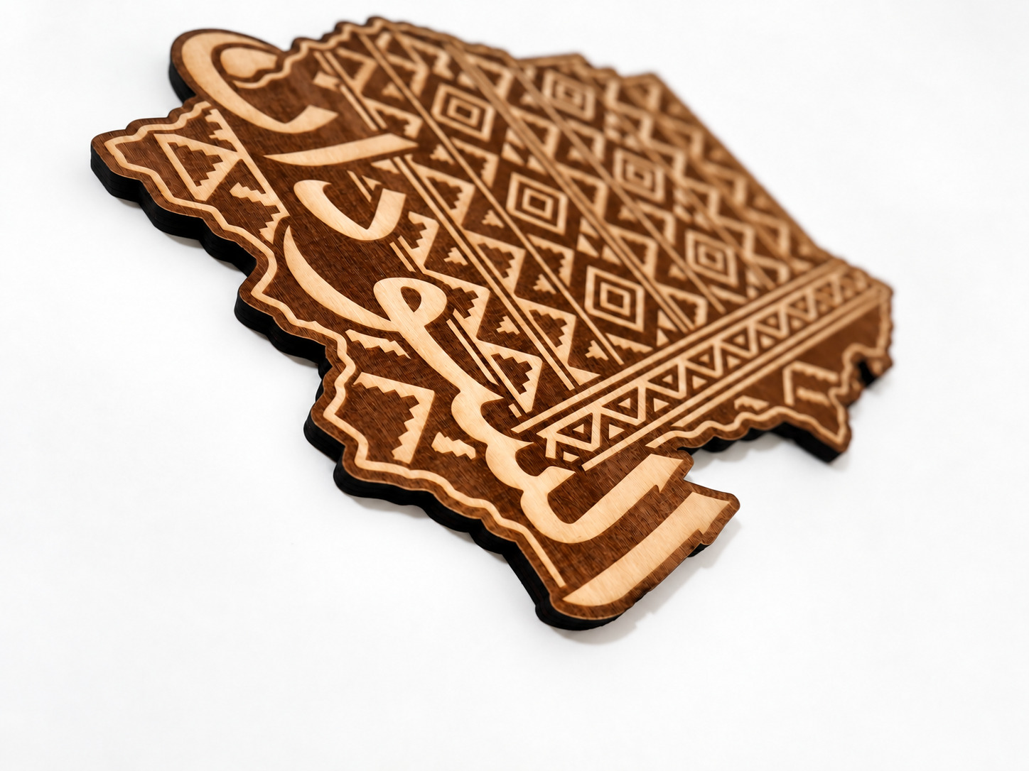 Photograph of Sudan · Pattern & Calligraphy with the faded engraving band locally tone-corrected; original photo is provided separately.